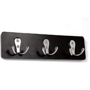 Crochets de base muraux noirs uniques en métal avec un design élégant, parfaits pour la décoration de la maison et l'organisateur de stockage de bureau moderne - Product Image 1