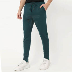 Pantalones deportivos de hombre de alta calidad con logotipo personalizado pantalones de jogging informales de talla grande XL ropa deportiva de algodón 100% liso teñido competitivo - Product Image 4