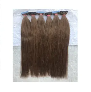 थोक थोक कच्चे मंदिर कुंवारी बाल असंसाधित टेप #6 से सीधे रेशमी चिकनी मानव बाल विस्तार आपूर्तिकर्ता भारतीय विक्रेता