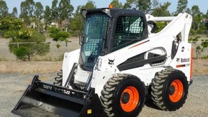 أصلي مستعمل صغير بوب كات S70 <span class=keywords><strong>Skid</strong></span> و S160 ، S130 انزلاقية مع جرافة أمامية