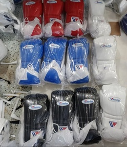 Nouveaux gants d'entraînement professionnels de boxe et de kickboxing en cuir 12oz et 16oz Caractéristiques de poinçonnage imperméables pour les compétitions - Product Image 6