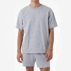 2024 conjuntos cortos de moda de verano de algodón 100% para hombre con logotipo personalizado al por mayor chándales estampados de 2 piezas con camiseta informal de talla grande - Product Image 1