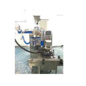 Pemasok grosir mesin pembungkus tugas berat dengan meja pengindeksasi untuk penggunaan industri oleh produsen India