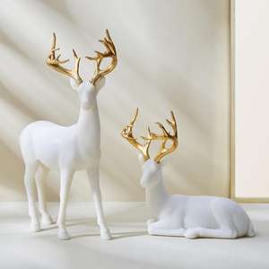 Juego de 2 Esculturas de Reno de Poliresina Blanca Magnus, Elegantes Figuras Decorativas para el Hogar - Product Image 1