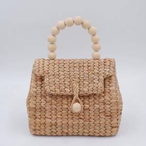 Bolso de playa de paja con cuentas y cierre de cremallera, diseño de cesta tejida para bodas, hecho en Vietnam - Product Image 1