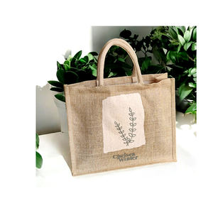 Bolsa de maquillaje suave de gran capacidad de tela de yute ecológica de alta calidad con cierre de cremallera diseño de bordado de moda - Product Image 4