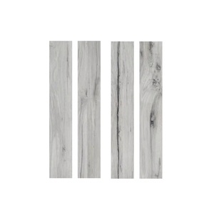 <b>Tiles</b> <b>Accessories</b> Nest Grey Carving Finished 200x1200mm Wooden Porcelain Floor <b>Tiles</b> for Worldwide Export From India - Product Image 1