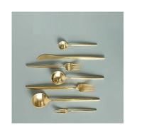 Ensemble de couverts en acier inoxydable de 7 pièces de haute vente ensemble de couverts plaqués or au design moderne et simple pour cadeaux
