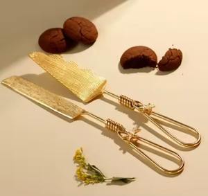 Ensemble de couteau et de serveur à gâteau en acier inoxydable doré, poignée unique pour les réunions de famille, service de desserts - Product Image 1