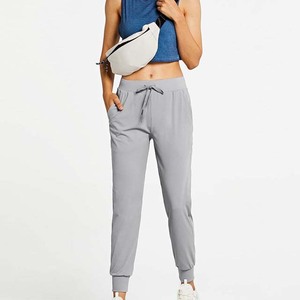 Pantalones Deportivos Planos de Invierno al Por Mayor a Precio Económico, Pantalones Deportivos Elásticos Personalizados OEM, Ropa de Mujer, Ajuste Regular, Transpirable - Product Image 1