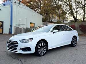 Audi A4 Premium 40 TFSI AWD 2023 d'occasion, blanc éclatant, toit ouvrant, démarrage à distance, sièges en cuir, jantes en alliage, boîte automatique, R17 foncé - Product Image 2