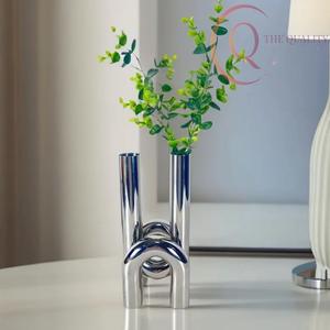 แจกันโลหะตกแต่งโต๊ะ ดีไซน์สวยงาม พร้อมผิวสัมผัสประณีต เหมาะสำหรับจัดดอกไม้ ตกแต่งบ้าน และตกแต่งภายในสไตล์โมเดิร์น - Product Image 4