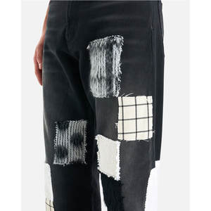 กางเกงยีนส์เย็บปะติดมีสไตล์ที่ดูเครียดและใส่สบาย - Product Image 3