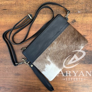 กระเป๋าสะพายคาดตัวใบเล็กหนังวัวแฟชั่นใหม่คุณภาพสูงสำหรับผู้หญิงกระเป๋าคลัทช์หนังแท้และกระเป๋าสตางค์แบบสะพายไหล่ - Product Image 1