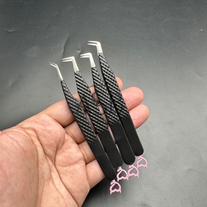 Pinzas de extensión de pestañas con logotipo personalizado negro mate Acero inoxidable sostenible con agarre de diamante Corazón probado a mano - Product Image 1