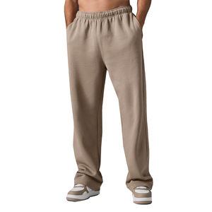 Pantalon de jogging décontracté surdimensionné en coton 100% de haute qualité avec logo personnalisé, respirant, à séchage rapide, pour la salle de sport, l'athlétisme et la course à pied - Product Image 1