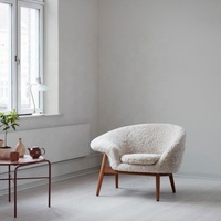 Fauteuil lounge en peau de mouton tufté fait main, design mid-century, durable pour la maison et les clubs