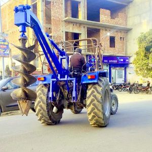 Motor de excavadora de agujeros hidráulicos montado en tractor de rueda 4WD de servicio pesado para trabajo de plantación de jardinería agrícola-El mejor precio al por mayor - Product Image 2