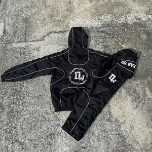 Conjunto Deportivo Unisex de Nylon con Capucha, Chaqueta Cortavientos y Pantalones de Dos Piezas con Logotipo Personalizado, Conjuntos Cortavientos de Poliéster para Otoño - Product Image 5