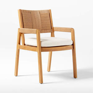 เก้าอี้รับประทานอาหารที่ทำจากโครงไม้สักเนื้อแข็งพร้อมหวายสังเคราะห์บนพนักพิงและมีเบาะรองนั่งสำหรับการใช้งานกลางแจ้งและในร่ม - Product Image 1