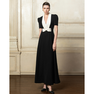 Intemporel et luxueux La robe longue Akina présente une silhouette féminine avec des manches bouffantes et un look de col audacieux - Product Image 2