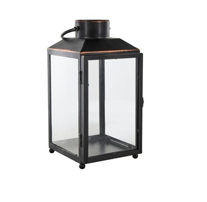 Portavelas decorativo de metal alto de hierro con asa para facilitar el transporte y la colocación, ideal para un ambiente cálido y acogedor - Product Image 4
