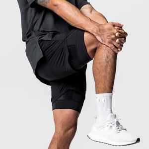 Entrenamiento de secado rápido Atlético Correr Ligero Hombres Beath Wear Deportes Gimnasio Pantalones cortos con bolsillos Chándal Pantalones cortos de gran tamaño para hombres - Product Image 2