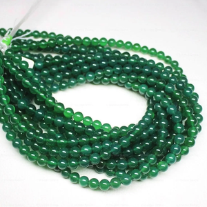 Perles de pierres précieuses rondes lisses en onyx vert naturel de haute qualité de 10 mm à prix de gros auprès d'un fabricant indien chez le meilleur revendeur - Product Image 1