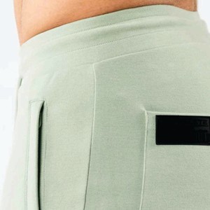 Venta al por mayor 100% algodón hombres Joggers pantalones Casual media cintura pantalones de chándal con capucha Private Logo Plain Running Workout Pantalones - Product Image 5