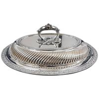 Plat de service en acier inoxydable de haute qualité, conçu pour rehausser les présentations de buffet lors d'événements et de célébrations
