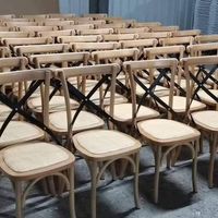 Chaises de réception de luxe dorées pour banquets, chaises de salle à manger en bois à dossier croisé pour restaurants et hôtels à prix de gros