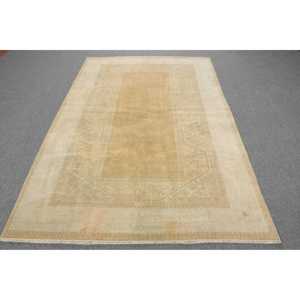 พรมตุรกีขนาด 5x7.7 ฟุต สีเบจ ลายอิคัต วินเทจ ทำจากขนสัตว์ - Product Image 1