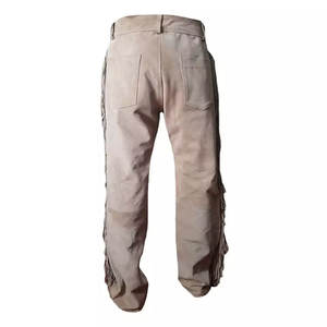 2025 nouveauté hommes décontracté frange daim cuir pantalon haut de gamme Western Cowboy gland pantalon toile tissu bas quantité minimale de commande - Product Image 1