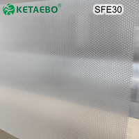 Film adhésif thermofusible haute élasticité transparent en rouleau pour vêtements de sport et pantalons de yoga sans couture