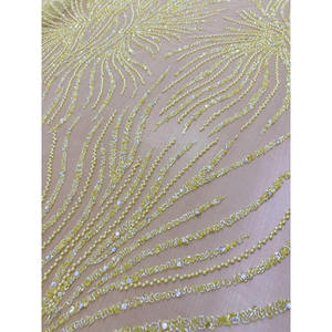 Tissu en organza transparent brodé motif soleil doré - Respirant et tissé - 100% polyester - Product Image 3