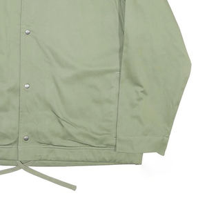 Veste d'entraîneur vert sauge minimaliste coupe-vent léger avec boutons pression et ourlet réglable pour un style streetwear décontracté - Product Image 2