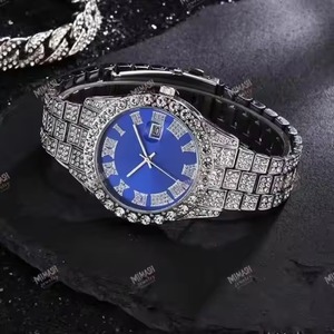 Reloj Iced Out de lujo con esfera azul, números romanos y bisel de diamantes CZ, reloj de pulsera ostentoso unisex de tono plateado para un estilo atrevido - Product Image 1