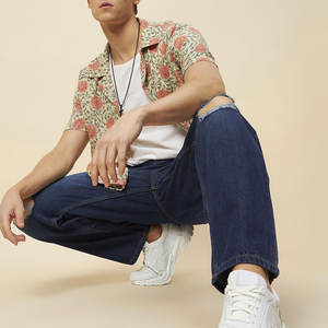 Jeans rasgados desgastados para hombres con un ajuste cónico y jeans rasgados resistentes con borde delantero a la moda - Product Image 5