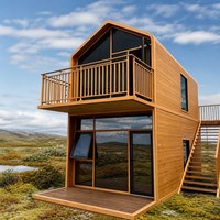 Petit chalet démontable à 2 étages de 50 m² en CLT avec finition bois et véranda