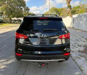 2022 para Santa Fe Sport SUV 4.1-6L FWD Volante a la Izquierda Asientos de Cuero con Interior Oscuro Neumáticos R16 - Product Image 2