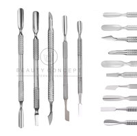 Outil professionnel double tête antidérapant en acier inoxydable pour éliminer les callosités, manucure et nail art, avec pousse-cuticules pour peaux mortes