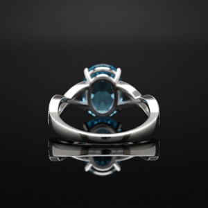 Anillo de Compromiso Minimalista de Plata de Ley 925 con Engaste de Bisel y Canal, Corte Ovalado, Topacio Azul, Certificado por Terceros - Product Image 4