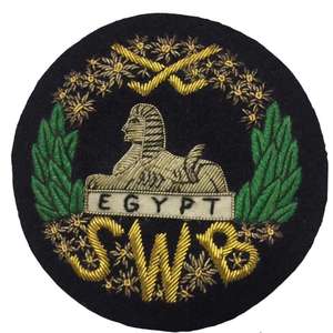 This is a South Wales Borderers blazer <b>badge</b> with a bullion wire design - Product Image 1