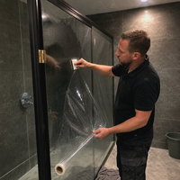 Film de protection de surface PE bleu anti-rayures pour murs-rideaux en verre, respectueux de l'environnement, personnalisable pour le transport de verre