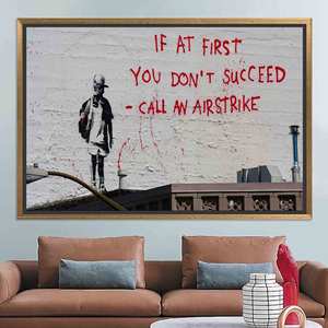 Banksy 'Call an Airstrike' Printed Canvas - Street Art Style,GOLD <b>FRAMED</b> CANVAS - Product Image 1
