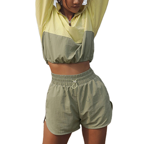 Conjunto de pantalones cortos deportivos Terzo para mujer con logotipo personalizado, Top corto para correr con media cremallera y ropa deportiva cortavientos para Fitness - Product Image 6