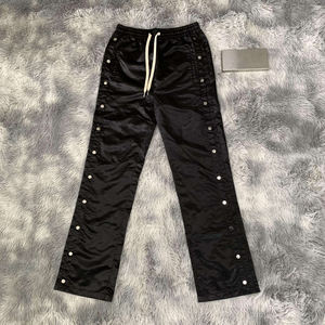 Pantalones cortavientos impermeables de poliéster para hombre, pantalones con botones laterales de nailon personalizados de alta calidad al mejor precio - Product Image 1