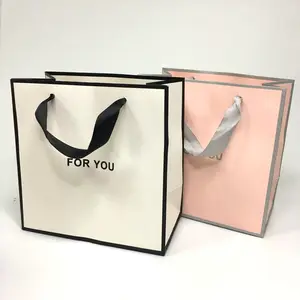 Custom Print Logo Elegant White Gift Paper Bags Pink Luxury Clothing Boutique Paper Shopping Bag With Ribbon Handle