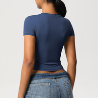 Haut de Pilates décontracté à séchage rapide en nylon double face T-shirt de sport à manches courtes pour la course à pied et le fitness.