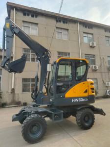 Mini-excavatrice sur roues HW60Eco jaune, capacité de la benne de 0,18 m³, moteur haute puissance de creusement, système hydraulique PLC - Product Image 3